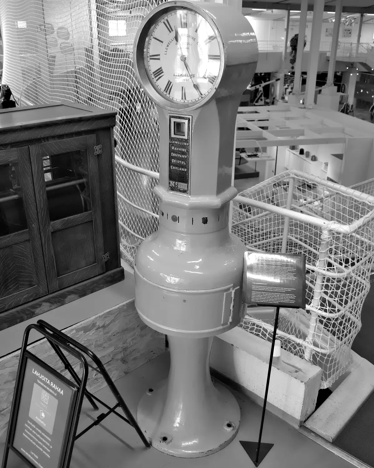 An early 20th-century employee time recorder on display at a museum of technology